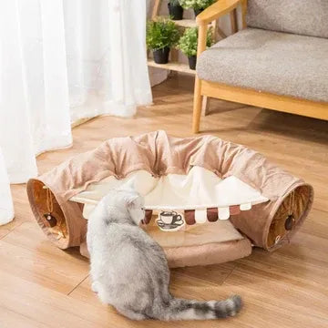 Fun tunnel and cozy bed combined for playtime and naptime bliss.