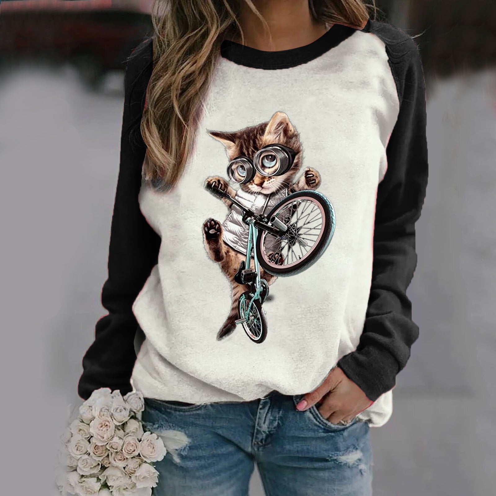 Cute cat-themed long sleeve tee for casual, playful style.