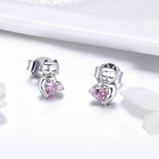 Cute and dainty cat-shaped stud earrings crafted in sterling silver.